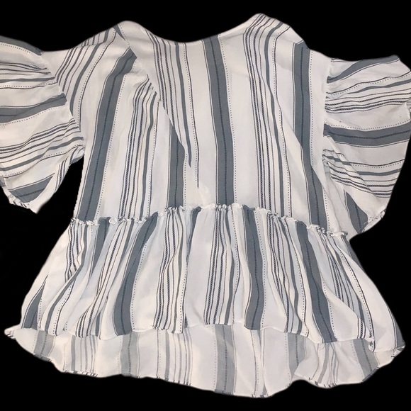 Anthropologie Tops - Anthropologie Back Detail Ruffle Babydoll Top